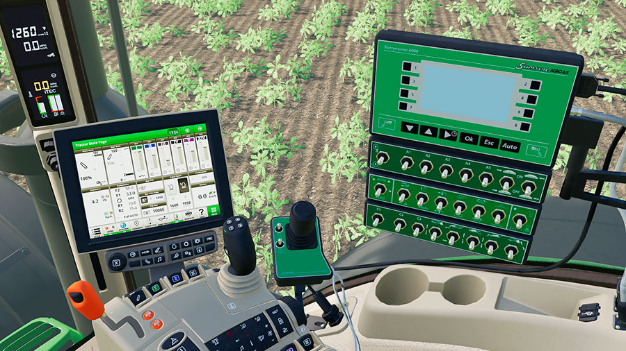 Two displays inside the cabin of a John Deere 7R mod