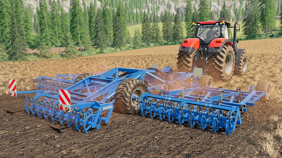 The Köckerling Allrounder Profiliner 850 from the rear, cultivating a field