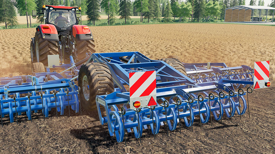 The Köckerling Allrounder Profiliner 850 pulled by a tractor