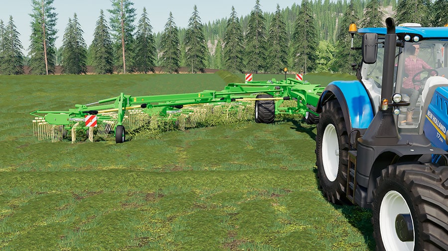 The Krone Swadro 2000 working in the field, collecting grass