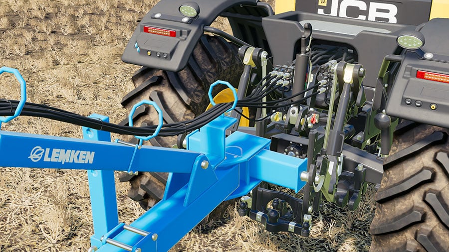 A close up showing the connection hoses of the Lemken Heliodor 9/600