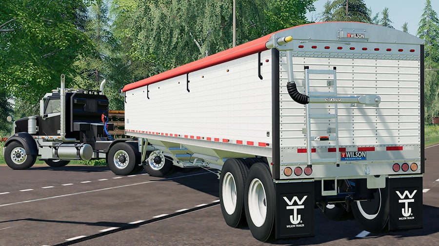 The modded Wilson Pacesetter, from the rear, pulled by a truck.